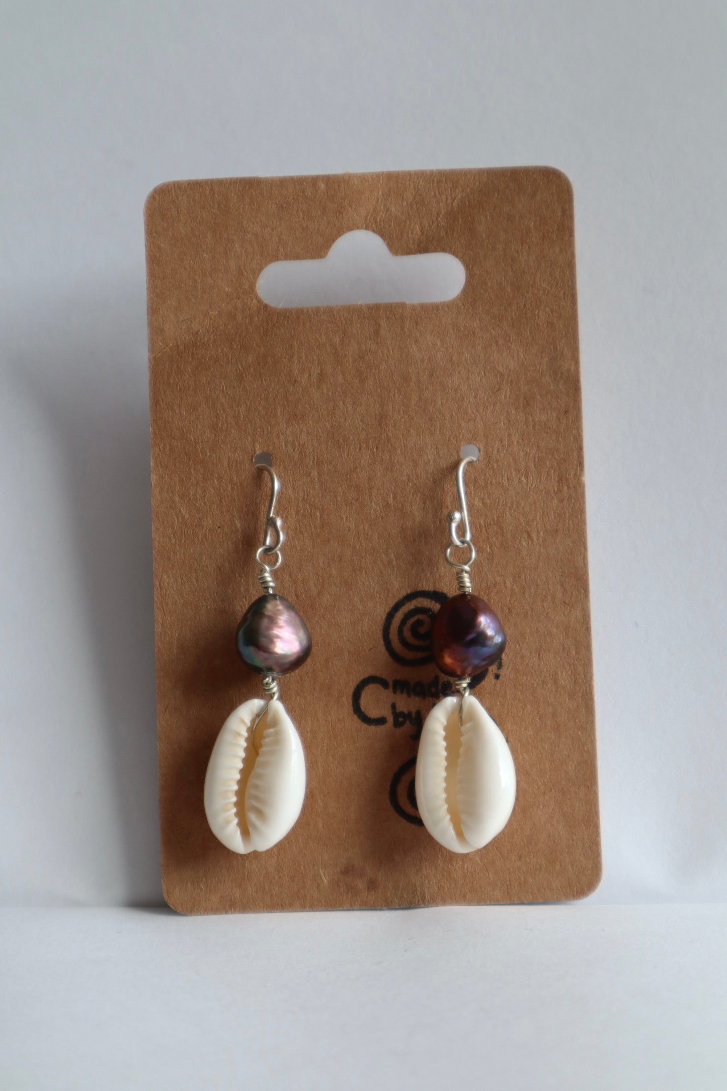 Black pearl x cowrie shell earrings