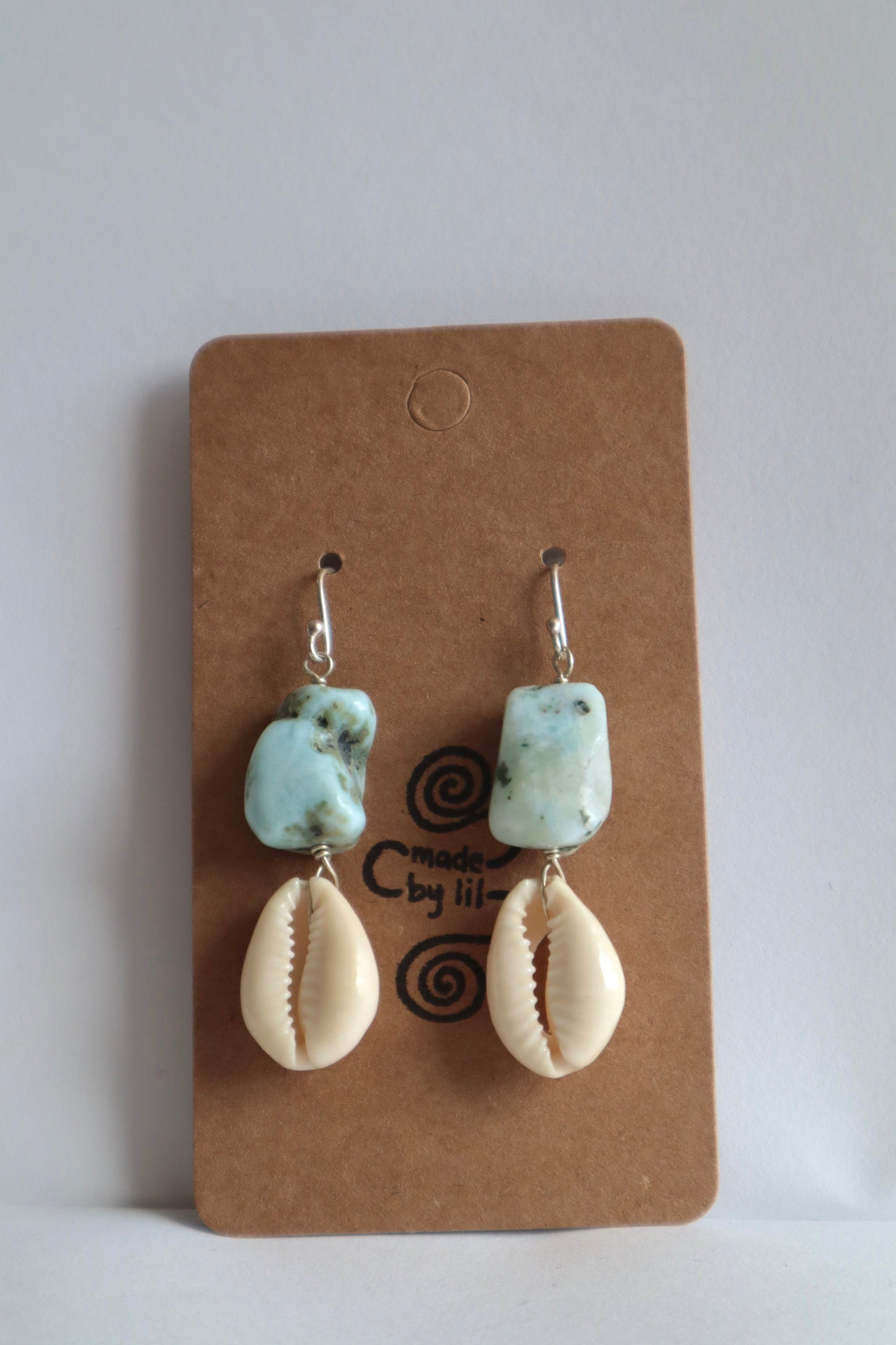 Larimar x cowrie earrings