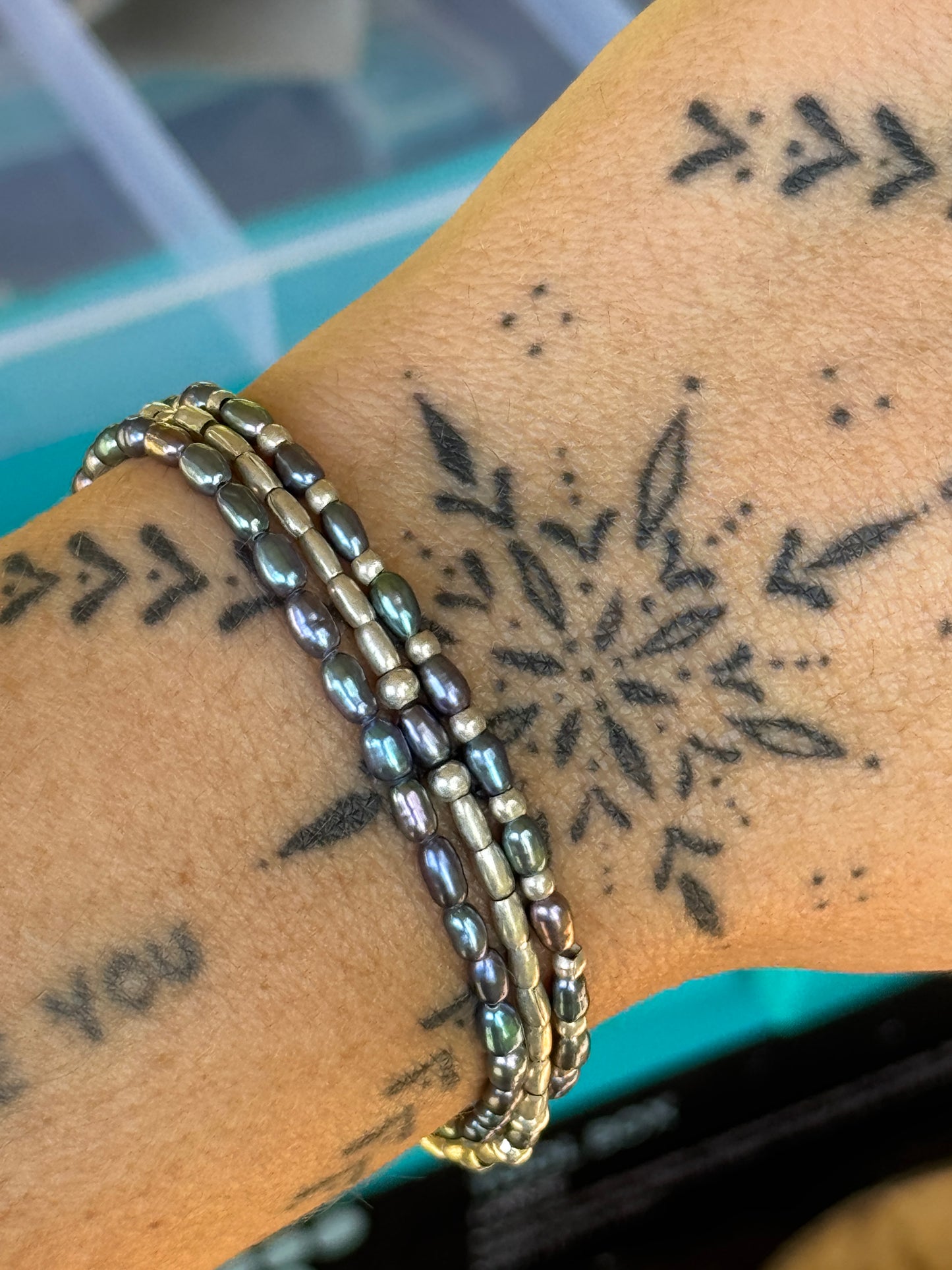 Small black pearl x silver bracelet