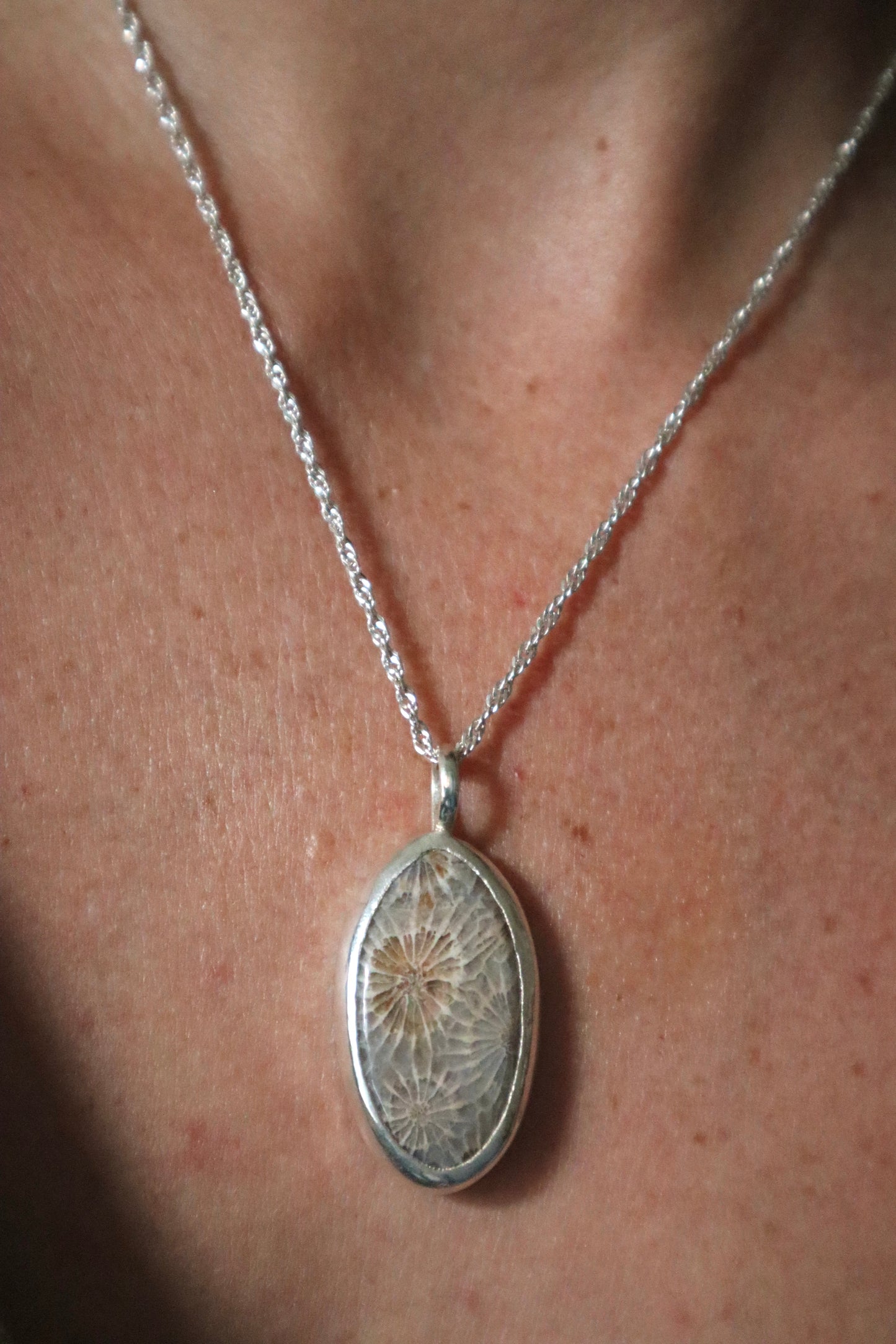 Fossilised coral pendant